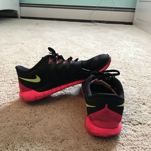 nike black, pink and lime green running sneakers